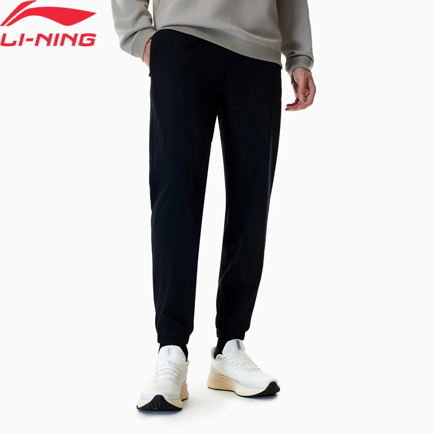 

Мужские тренировочные брюки Li-Ning LN FAST DRY, стандартный крой, 86% полиэстер, 14% эластан, брюки для фитнеса LiNing AYKW295