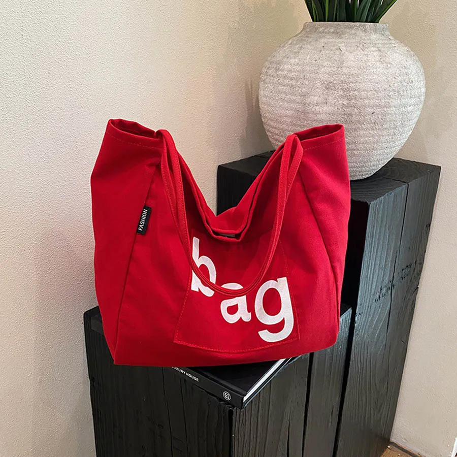 

Large capacity canvas bag for women 2025 new Korean ins minimalist letter tote bag, student class shoulder bag
