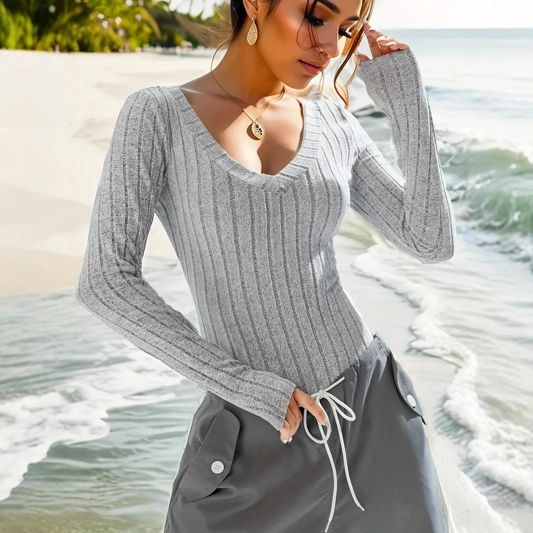 

V-neck Knitted Jumpsuit Europe and The United States Spring and Fall Casual Slim Thin Sexy Tight Long-sleeved Blouse Female