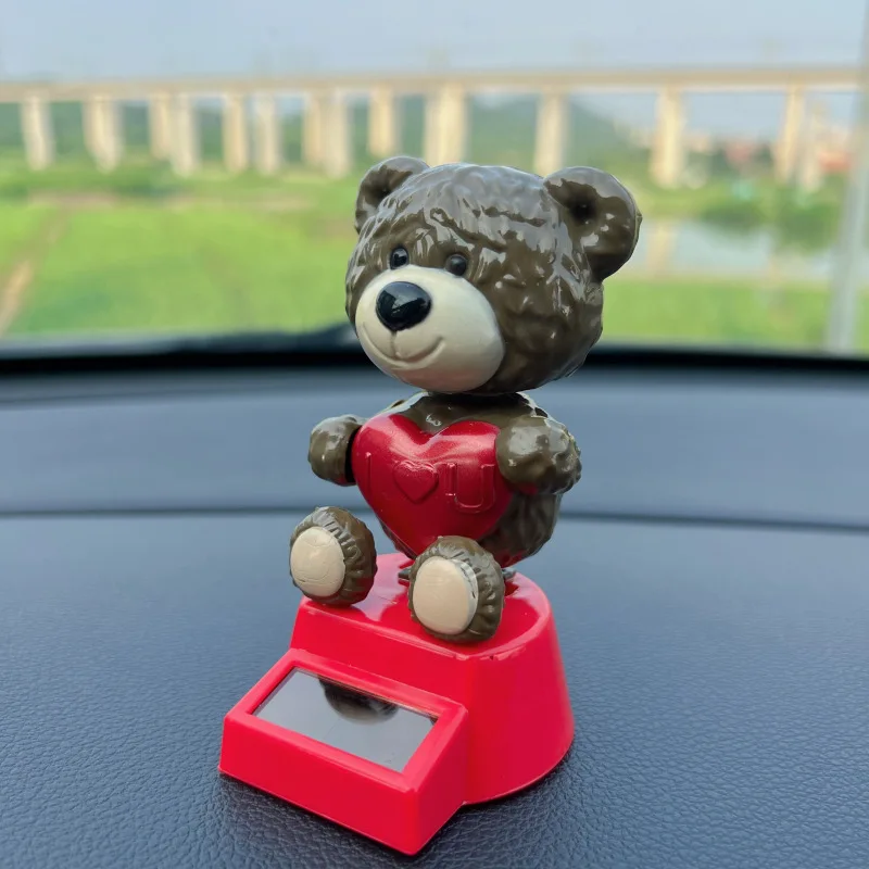 

Новая солнечная игрушка-медведь с сердечком, настольный автомобиль, декоративные украшения, мультяшный милый медведь, трясущаяся голова, танцующие солнечные игрушки, креативные подарки