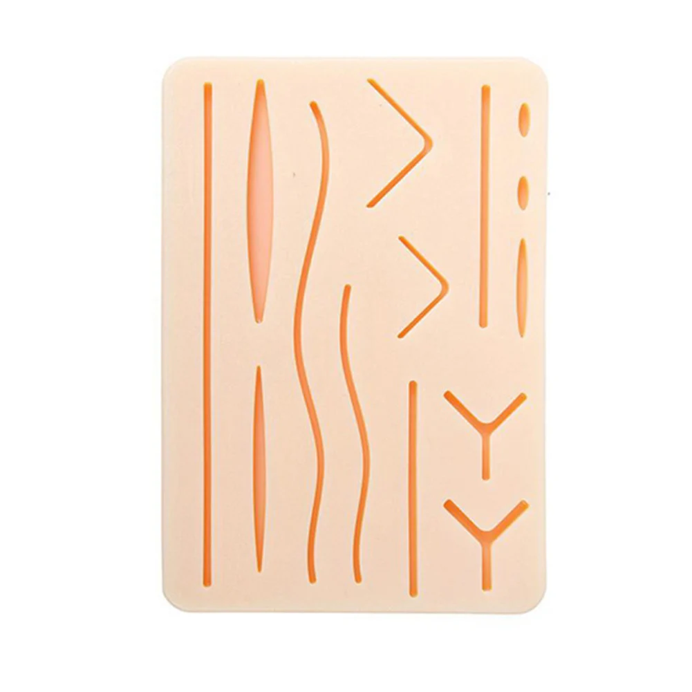 نموذج ممارسة خياطة يعمل على الجلد مع مجموعة أدوات خياطة الجروح المقطوعة مسبقًا وإكسسوارات أدوات التدريس الطبية