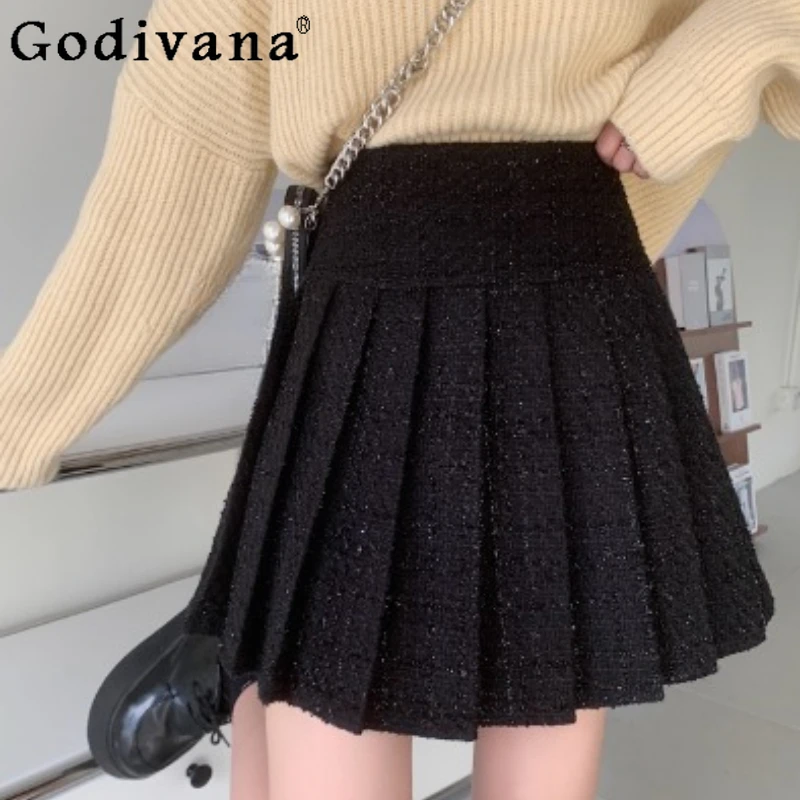

Большой размер, черные темпераментные трапециевидные модные корейские короткие юбки, женские осенне-зимние новые шикарные сексуальные плиссированные юбки с высокой талией