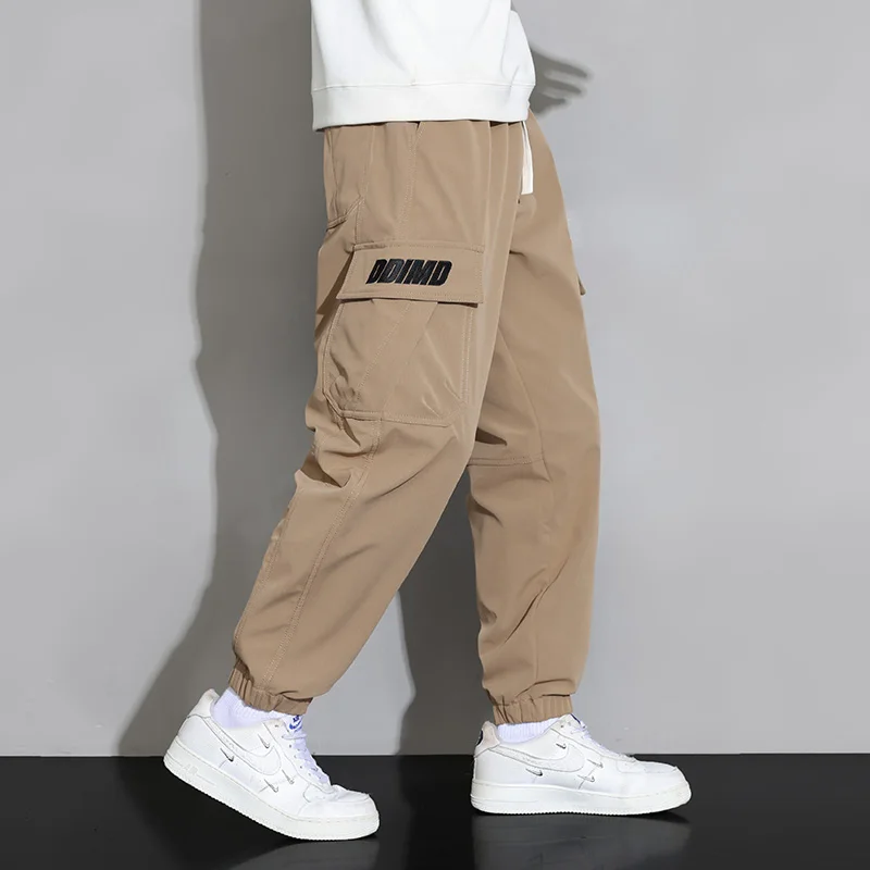 Pantalones Cargo holgados de cintura alta para hombre, pantalones deportivos de talla grande, informales, con bolsillos, a la moda, primavera y verano