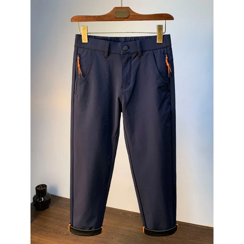 Pantaloni casual da uomo larghi a tubo dritto per la primavera e l'autunno 2025, pantaloni da pendolarismo alla moda da uomo elastici con tasca con cerniera di tendenza