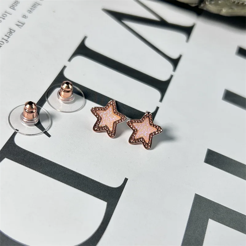 Exquisite colorful crystal teeth star small earrings jewelry Europe and the United States wind geometric pentagram earrings