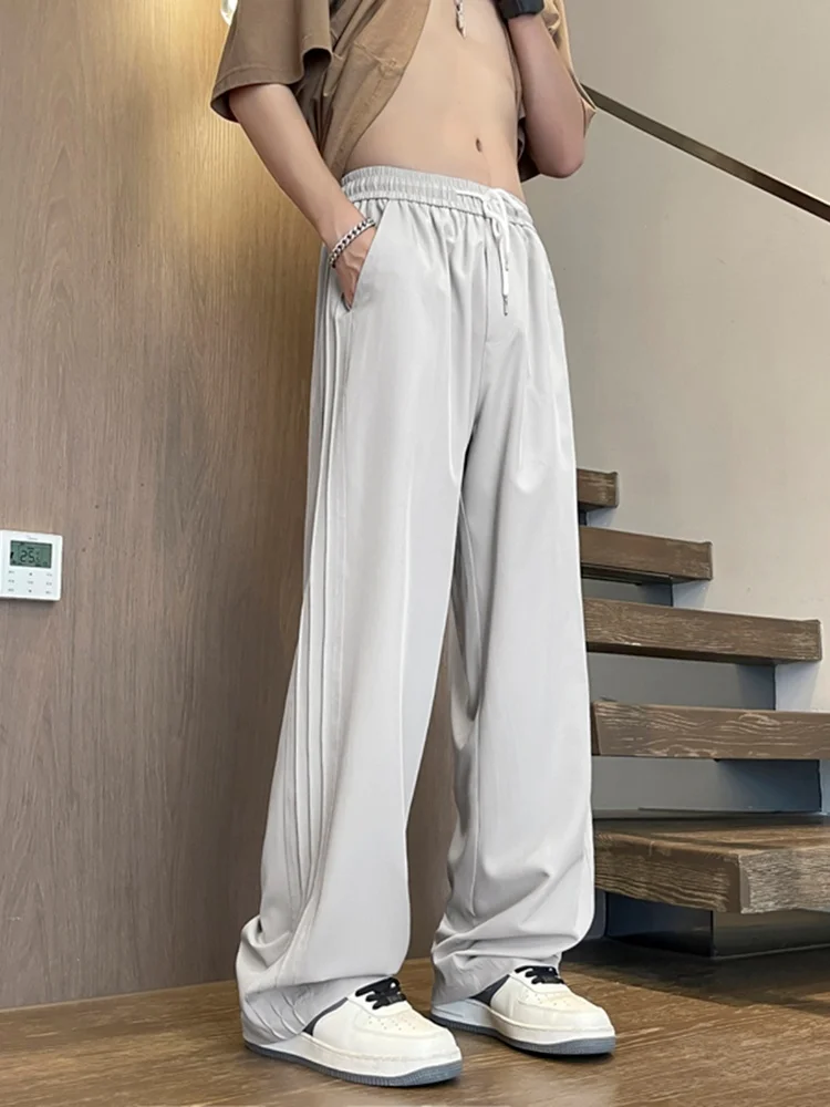 

Легкие мужские повседневные брюки из ледяного шелка: летние, дышащие, струящиеся, прямого кроя, удобные, в корейском стиле, свободного силуэта