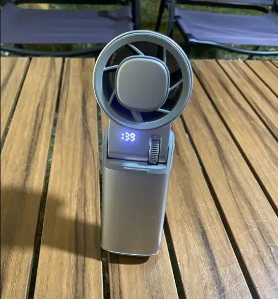 

2026 new handheld semiconductor refrigeration ice compress super long battery life folding outdoor portable small fan with light