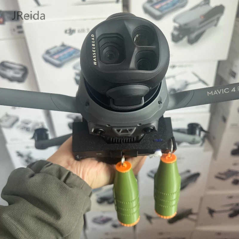 Dual-function drone airdrop igniter, quick-release installation, Mavic 4 outdoor aerial photography drop ignition accessory.