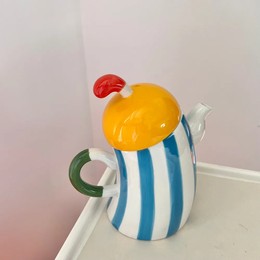 

Cute Ceramic Teapot With Tea Infuser Hole ,Akimbo Handle Beautiful Tea Pot Water Kettle Porcelain Jug With Lid 1L