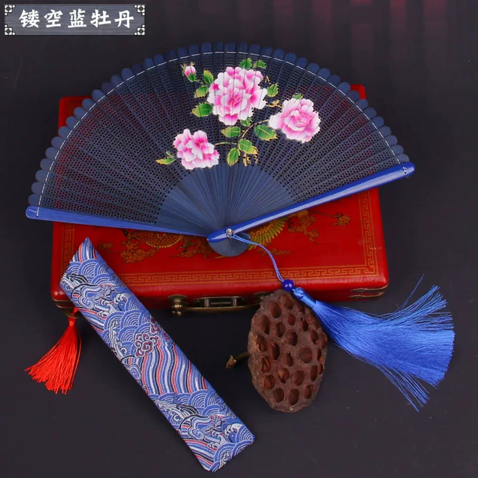 Small and portable bamboo fan with tassel folding, ancient Chinese style gift fan