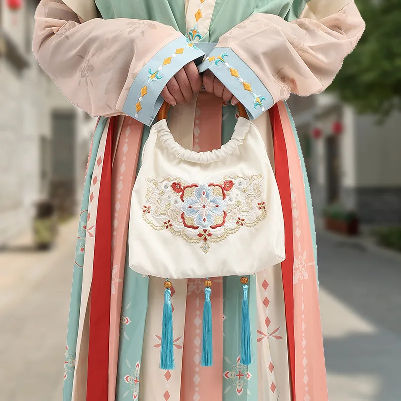 New Chinese embroidery bag with personalized high-end feel,  Hanfu bag, retro tassel embroidery handbag, fabric