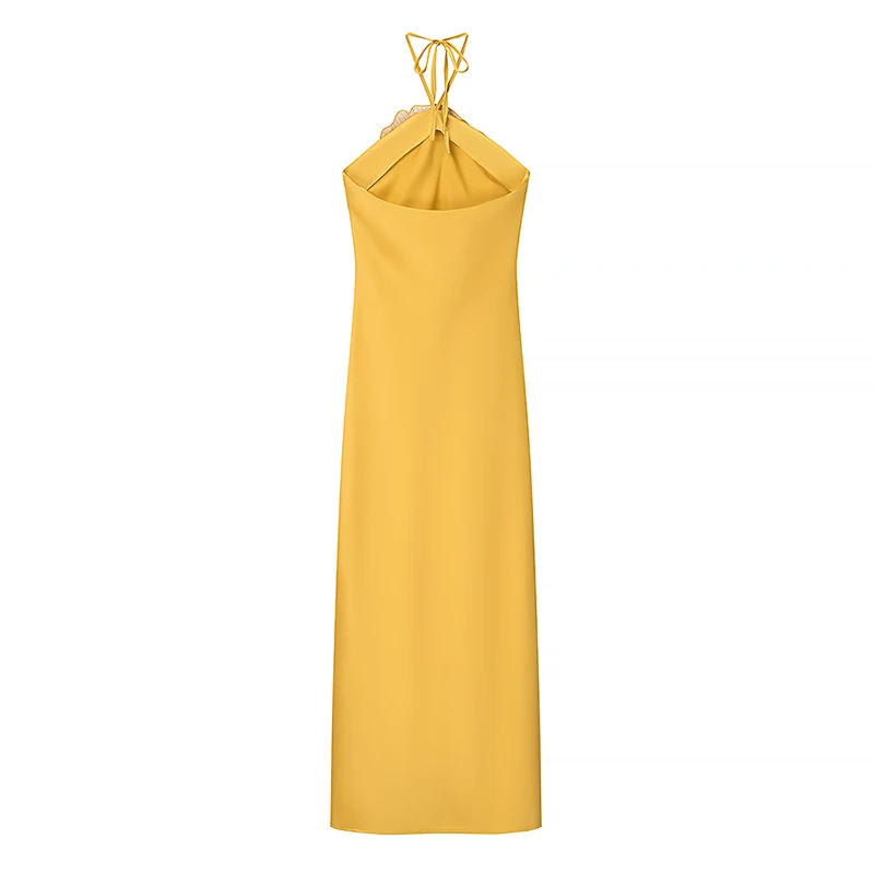 are halter dresses in style 2025 This It GirlApproved Style Will Be *the* Summer Vacation Dress Trend of  2025