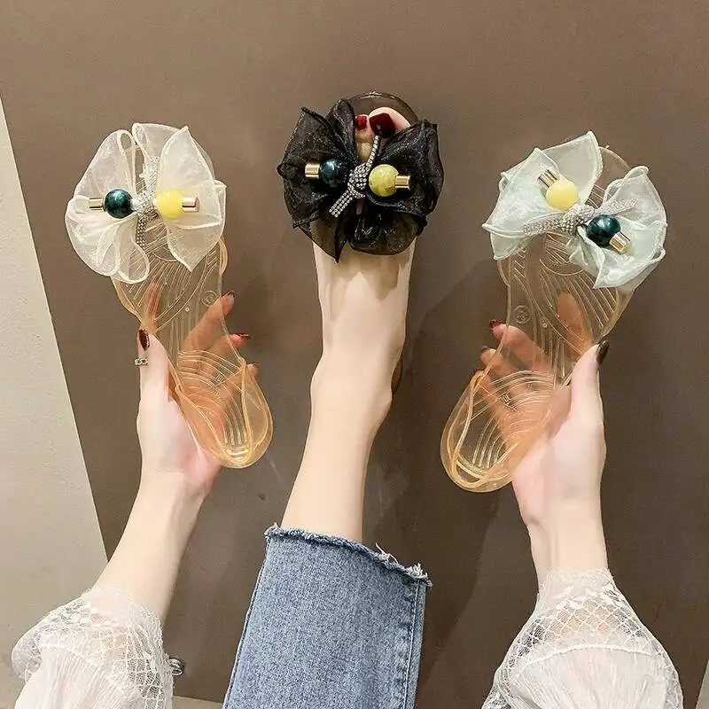 

2026 New Summer Sweet Bow Jelly Sandals Women Transparent Crystal Soft Waterproof Beach Outdoor Wear Slip On Ladies Rain Shoes