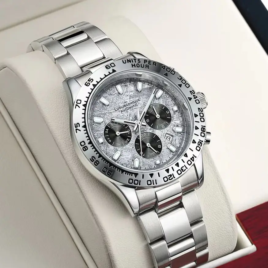 新しいハイエンドビジネスアイスブルー隕石三目六針多機能全自動機械式時計、男性用、中空デザイン、ステンレススチールストラップ、ラウンドダイヤル、ファッショナブルなビジネスカジュアルスタイルのトレンディなメンズウォッチ、ボーイフレンドへの理想的なギフト