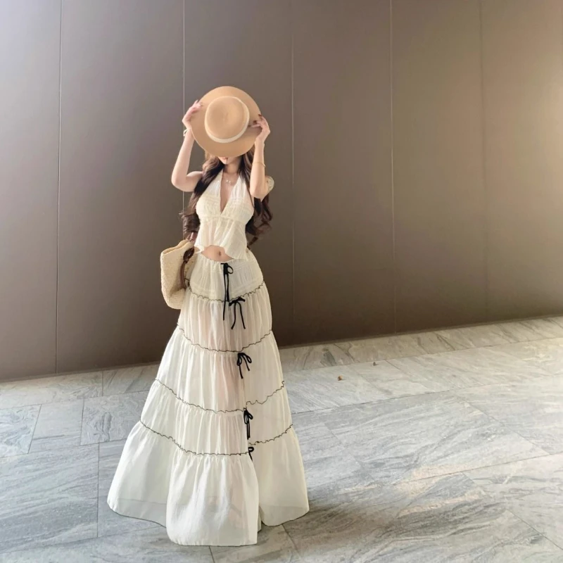 

Женский летний пляжный комплект 2026: укороченный топ с V-образным вырезом и бретельками через шею, прозрачная сетчатая юбка миди с завышенной талией, комплект из двух предметов