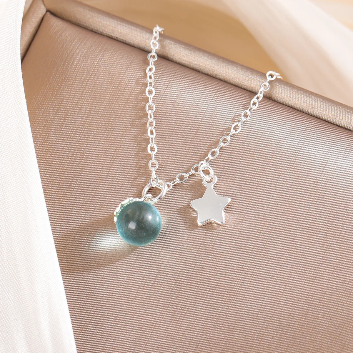 Uini-Tail hot new 925 sterling silver star blue artificial crystal pendant necklace Korean fashion trend sweet jewelry XL085