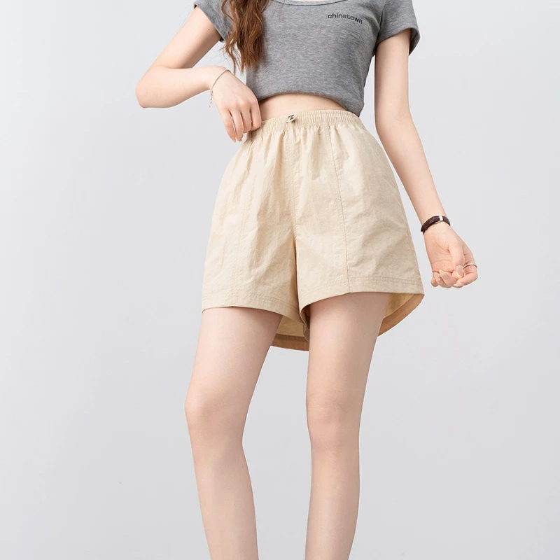 مرونة الخصر الأدوات غير رسمية السراويل النساء الملابس 2025 صيف جديد التوابل فتاة موضة الصلبة الرياضة رقيقة سراويل تقليدية النساء