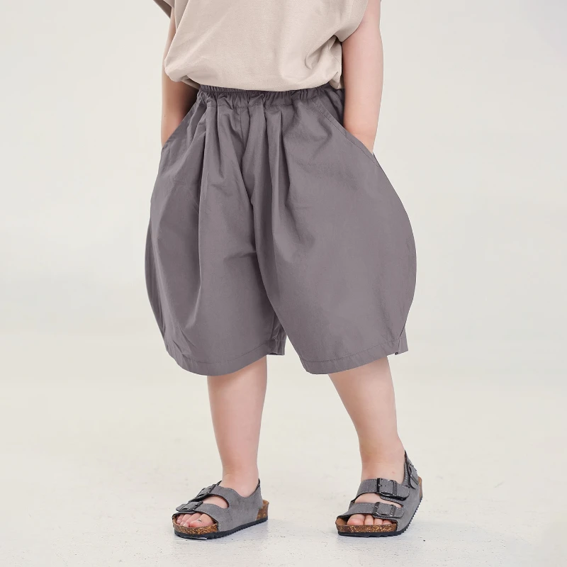 2026 New Summer Hot Selling Cotton Fabric Simple Elastic Waist Closure Pants Legs Solid Color Mid Pants for Children