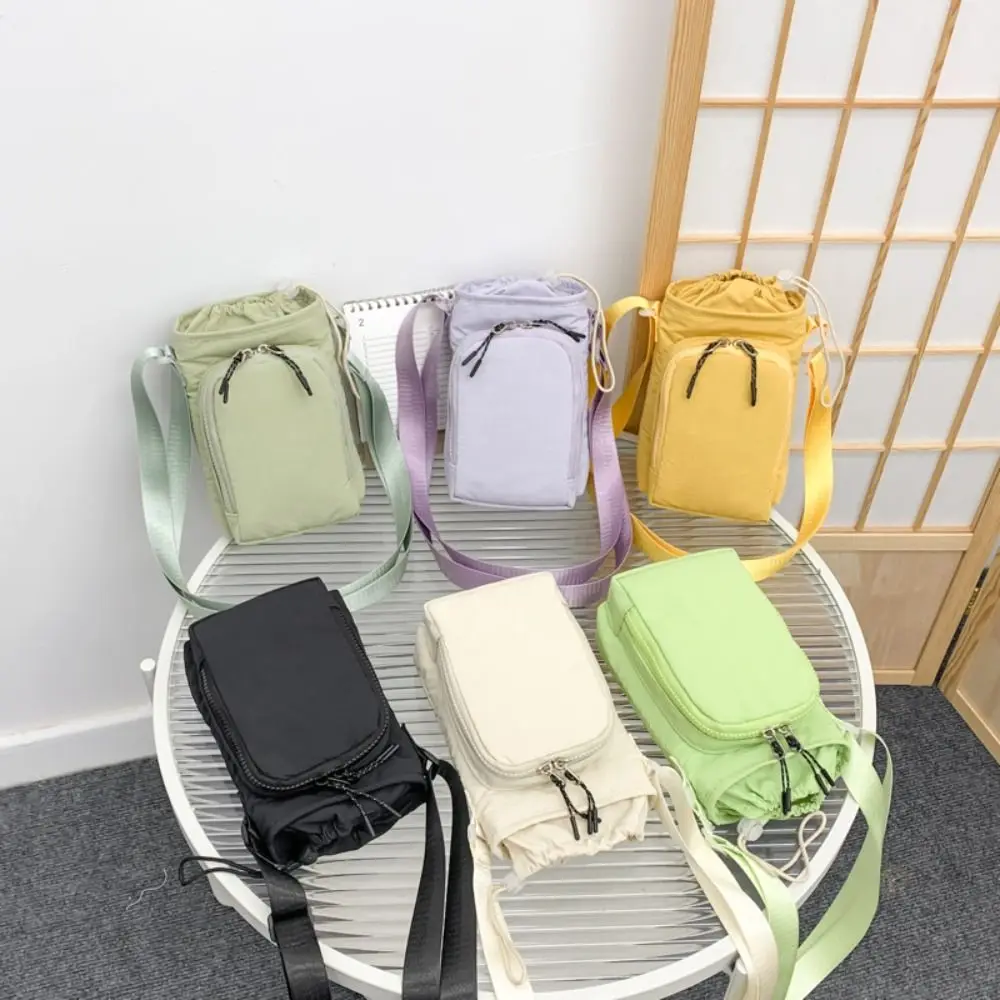 

Shoulder Strap Water Bottle Carrier Bag Front Pocket Adjustable Water Bottle Holder Drawstring Open Top Handle