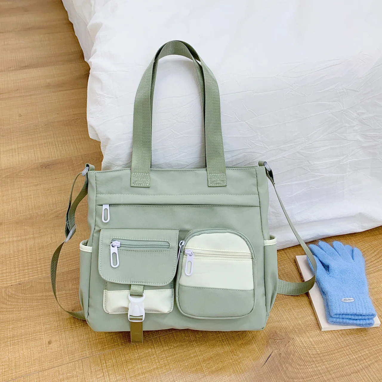 Lightweight nylon fabric student commuting color-blocked large-capacity hand-held tutorial bag, multi-pocket single-shoulder bag