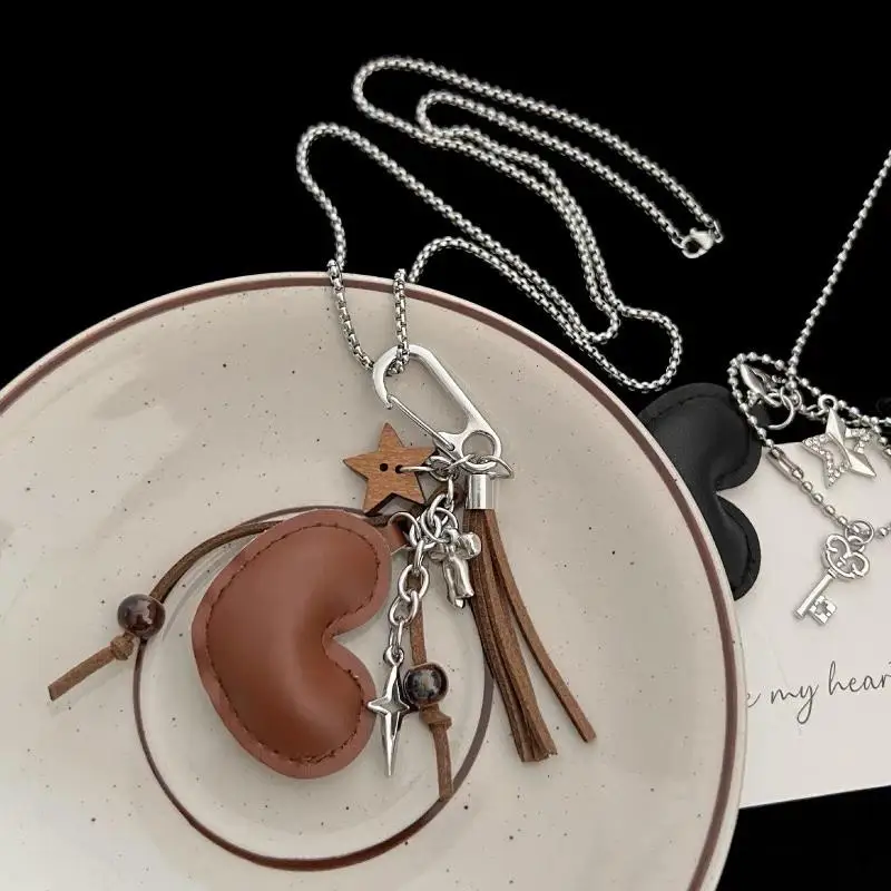 Regali di gioielli con catena per maglione stile lungo vintage Catene per maglione versatili Nicchia Ins Pendenti con borsa in metallo Collana retrò per le donne