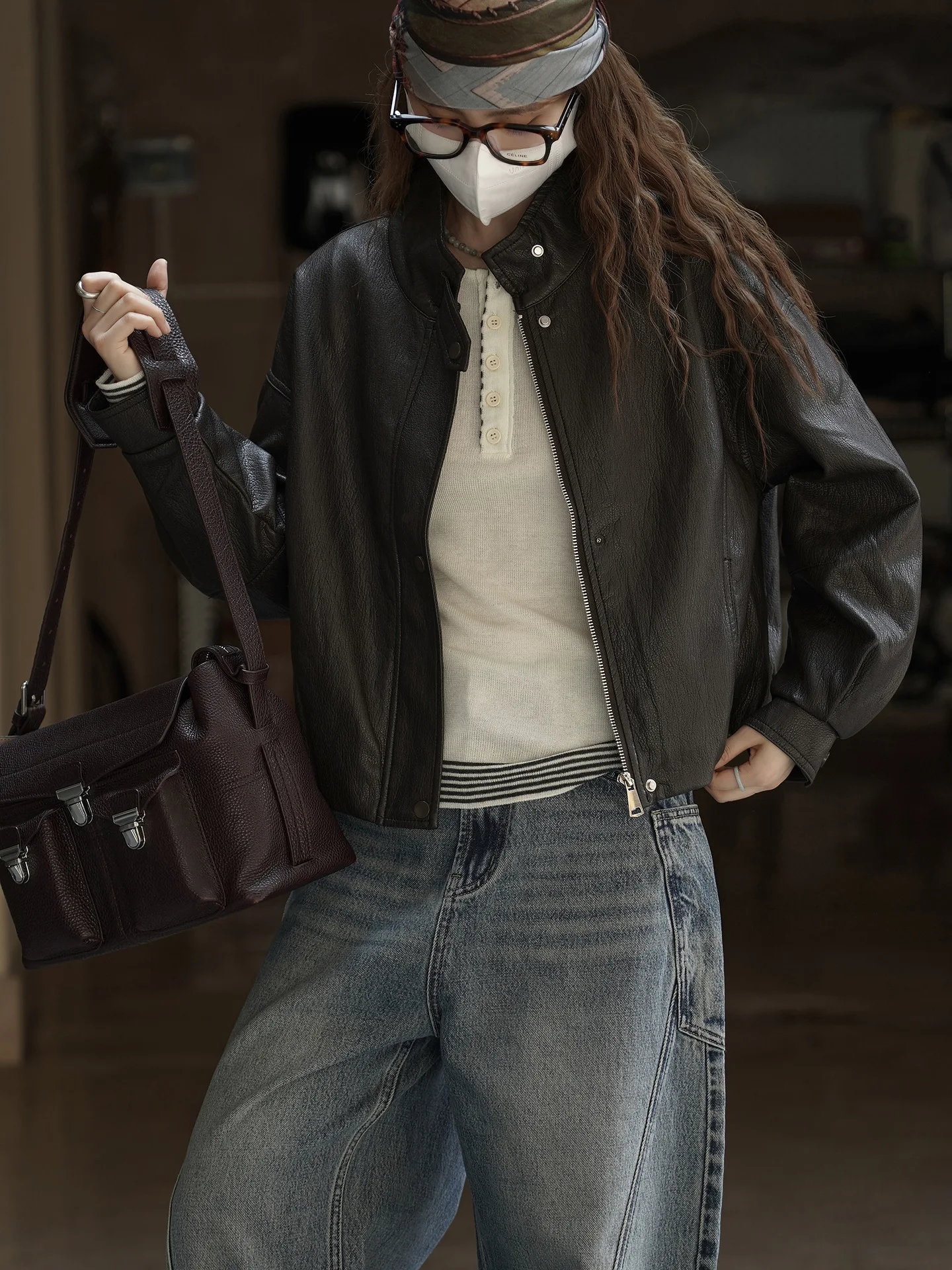 Fashionable and cool stand up collar split short jacket with a stylish silhouette design for women