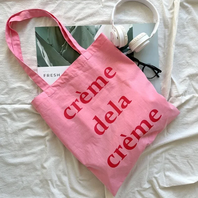 Borsa da spiaggia di colore rosa di grande capacità Borsa per rossetto per trucco cosmetico Borsa a tracolla in tela da donna Borsa tote con lettera Ins