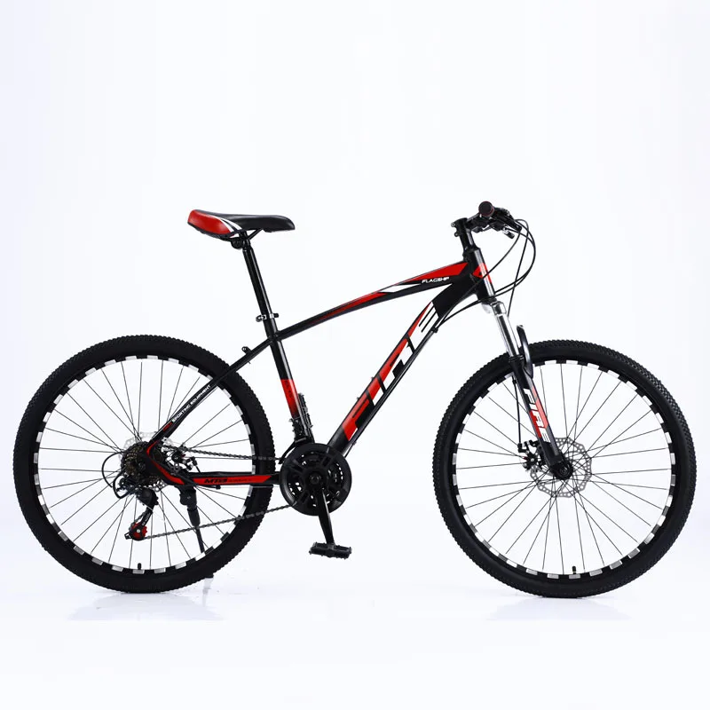 Fabricante al por mayor bicicleta de montaña de 26 pulgadas velocidad variable bicicleta para adultos absorción de impactos freno de disco doble bicicleta extranjera tra