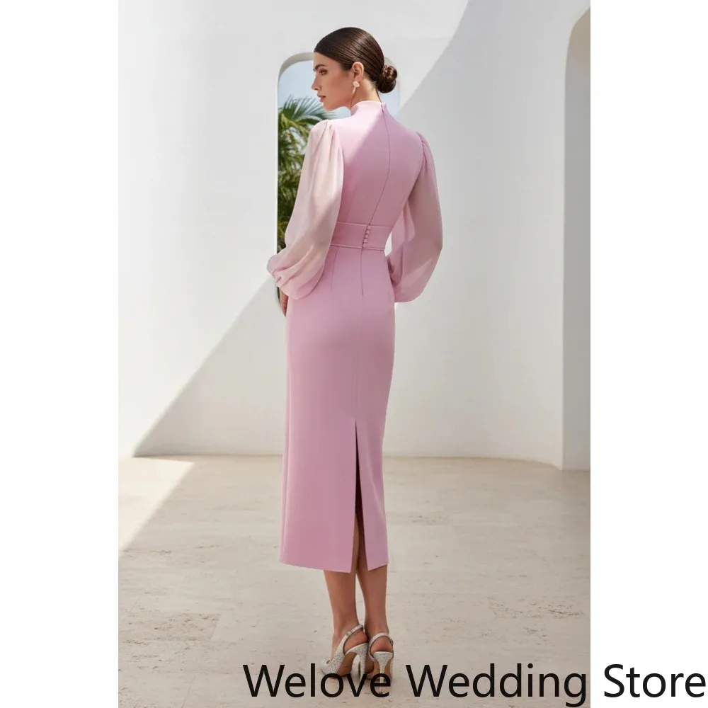 Pink Formal Midi Dress Featuring deep V-neckline sheer flowy bishop sleeves tailored sheath silhouette with a subtle front slit