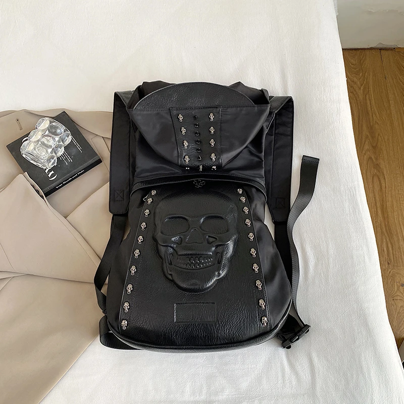 2026 New Dark Punk Gothic Hooded Backpack for Unisex 3D Skull Embossed Rivet Decor Streetwear Large Capacity Travel Backpack