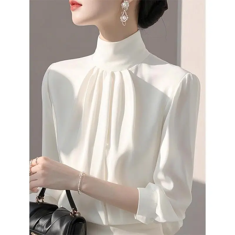 Spring French style unique, beautiful, light luxury, niche, high-end, good-looking white commuter long sleeved shirt