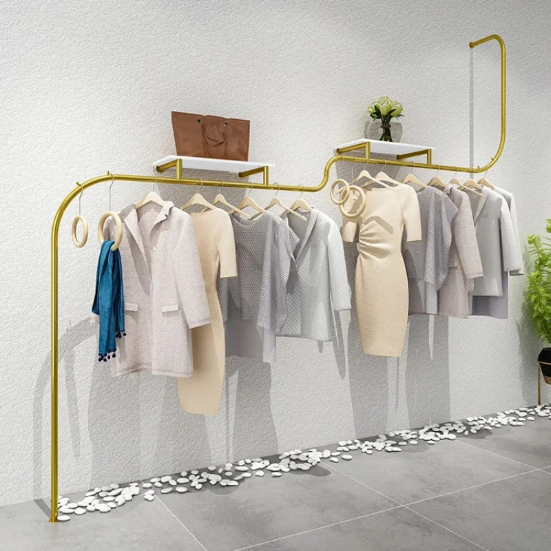 custom.Retail Metal Cloth Women Garment Store Clothes Stand Boutique Shiny Gold Stainless Steel Clothing Wall Mounted Rack