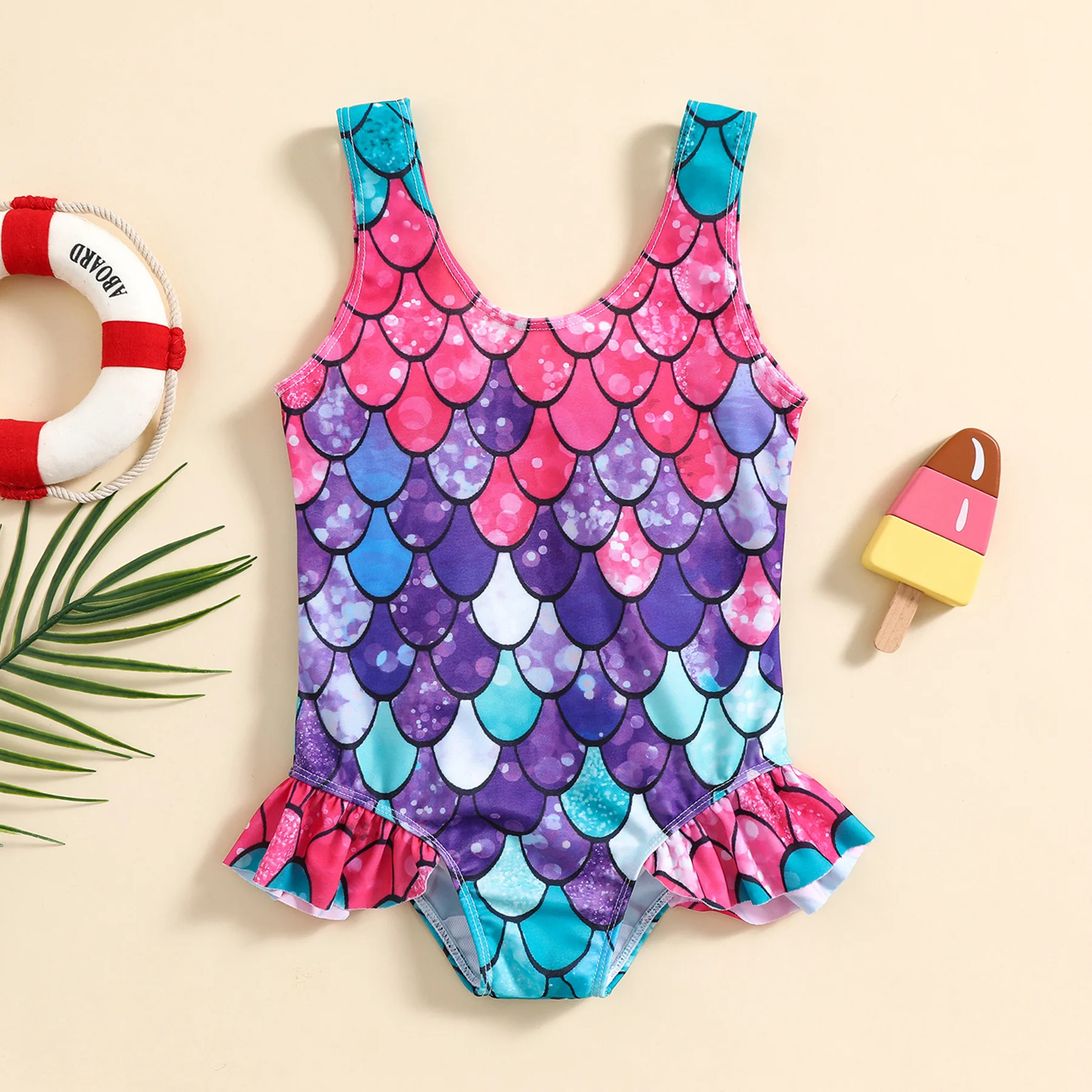 Toddler one piece swimsuit with ruffle and colorful mermaid scale pattern for beach and pool water play
