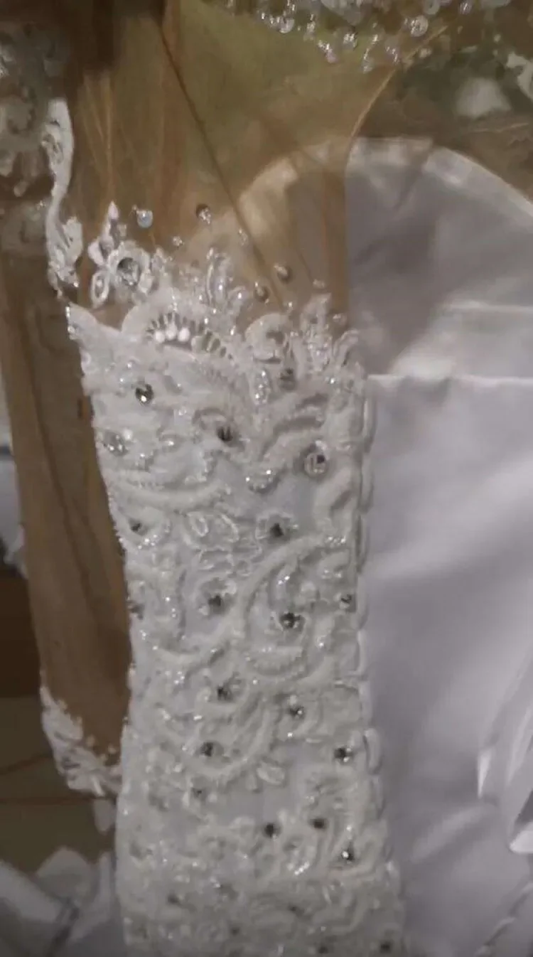 Abito da sposa a sirena con scollo rotondo personalizzato con applicazioni di cristalli pesanti Robe De Mariée Abiti da sposa a maniche lunghe con illusione africana