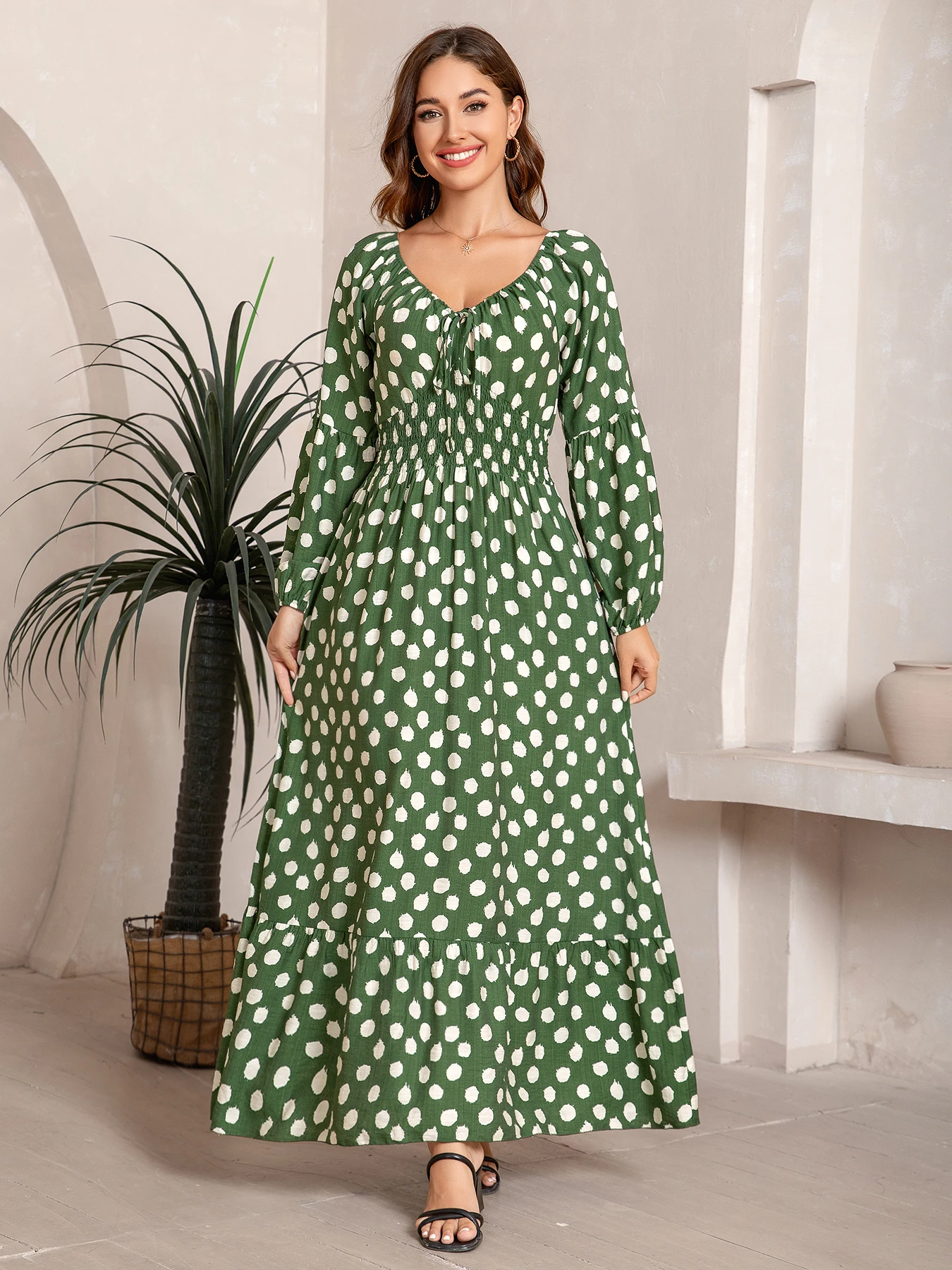 

Women's vacation style dress, V-neck, long sleeves, gathered waist, A-shaped long dress. Green polka dots, cute and elegant.