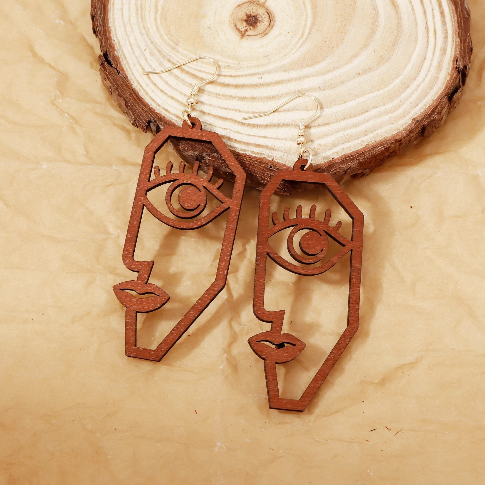 Laser cutting hollow abstract face creative earrings wooden fashion personality simple