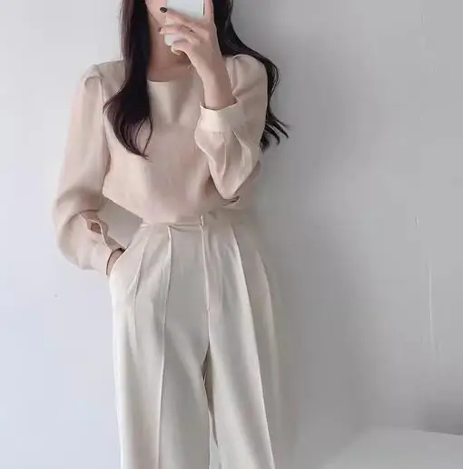 2026 Early Spring Fashion Simple Round Neck Mesh Slightly Transparent One Button Hollow Out Long Sleeved Bottom Shirt Top Women