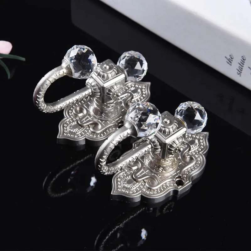 

1 pair of European zinc alloy crystal curtain hooks, curtain wall hooks, wall hooks, binding straps, rope hooks