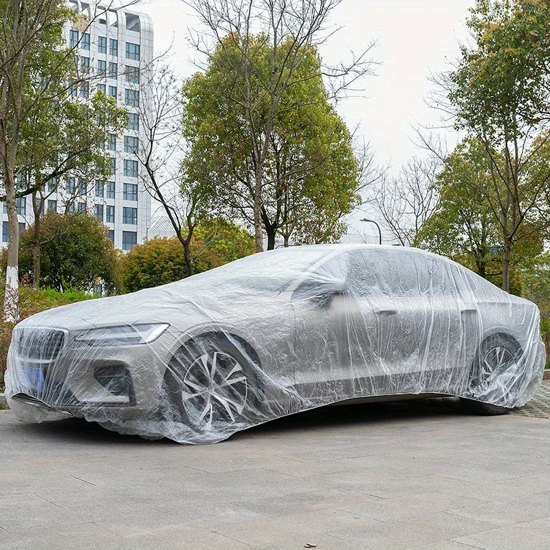 Transparent PE material car cover fitting design, fully protecting the vehicle from sun, rain, and dust, disposable car cover
