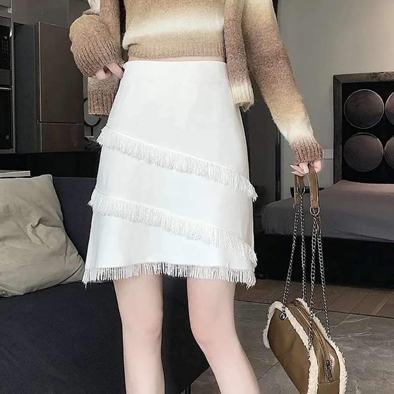 Rok Setengah Rajutan Wanita Rok A-line Pelangsing Pinggang Tinggi Mode Rok Pendek Pinggul Warp Hitam Pinggang Elastis Rumbai Seksi