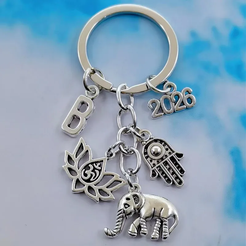 Fashionable A-Z letters Women's tribal ethnic cute key ring Unique enamel elephant key ring Bohemian gift lotus ornaments