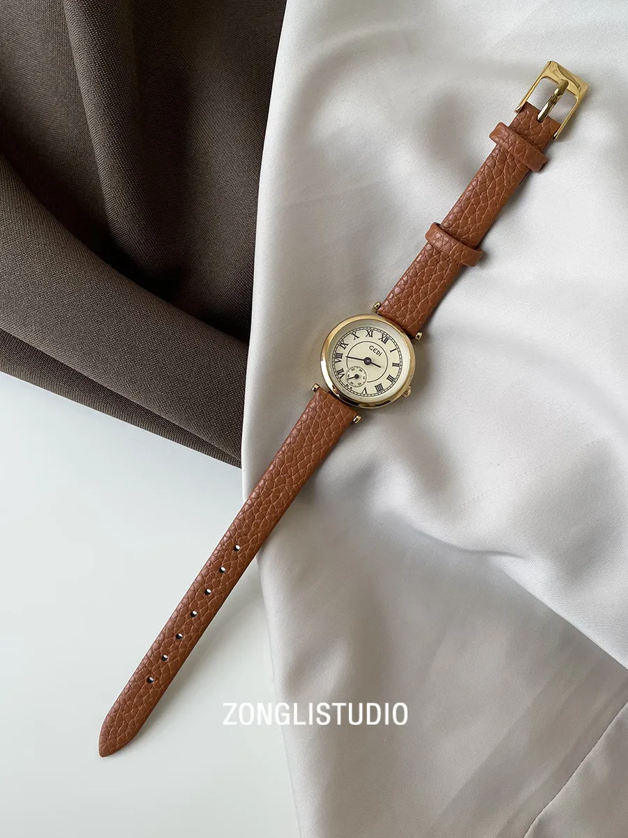 Retro And Artistic Women'S Watch, Round Dial, Exquisite Korean-Style Design, Fashionable Leather Strap, Versatile For Students.