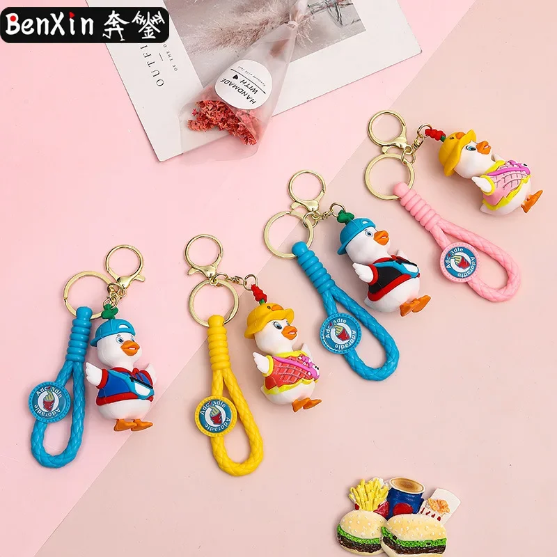 

Miniso crossbody bag pendants, duck key chains, a pair of schoolbag pendants, claw machine dolls, key chains
