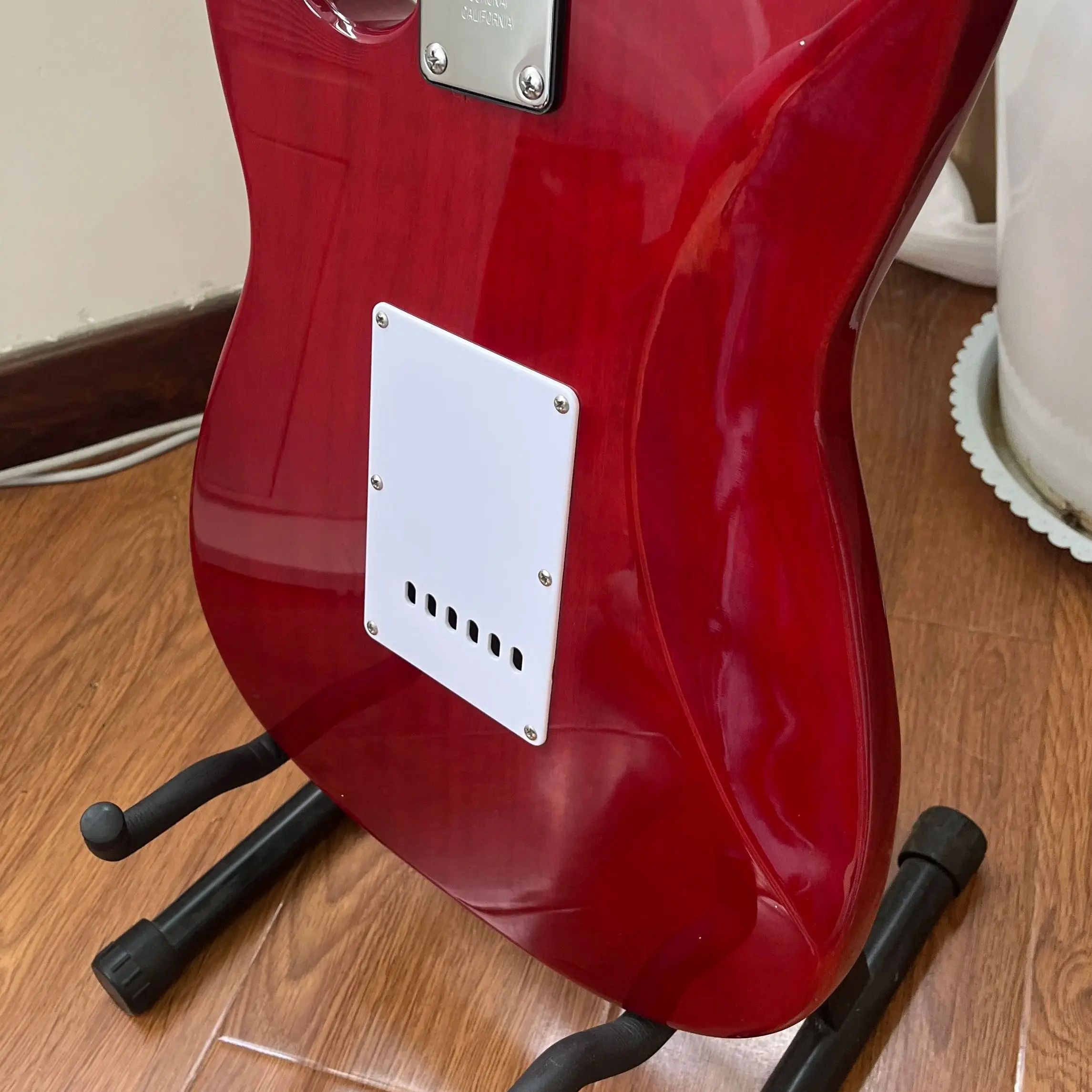 جيتار كهربائي برتقالي مصنوع احترافيًا مصنوع من جسم الماهوجني ولوحة أصابع من خشب الورد. شحن مجاني.