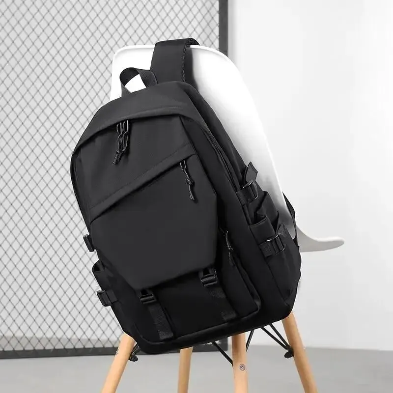 Один 15-дюймовый полиэстер водонепроницаемый сплошной цвет простой мужской рюкзак мода пара студент компьютер рюкзак