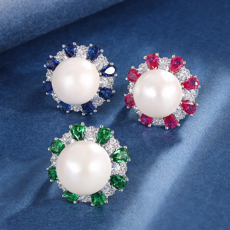 

New European and American fashion sapphire, ruby, emerald, and pearl encased ring for women