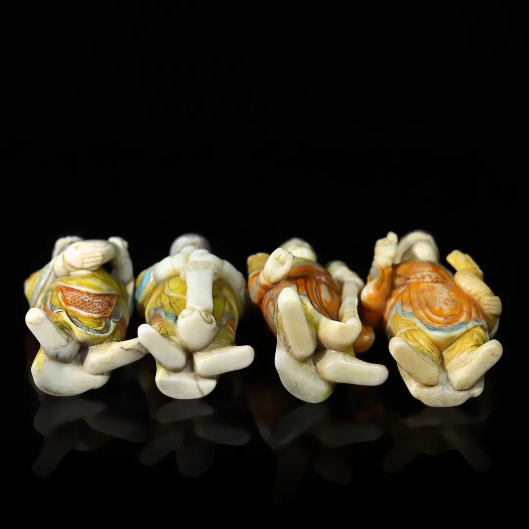 A set of white hibiscus stone hand-carved and painted four heavenly kings ornaments