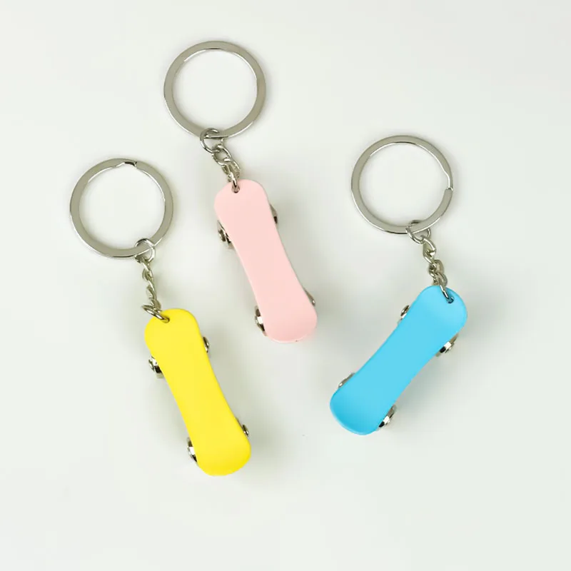 New Metal Duty Skateboard Keychain Simulation Colorful Mini Skateboard Keychain Portable Key Ring Bag Car Accessories Pendant