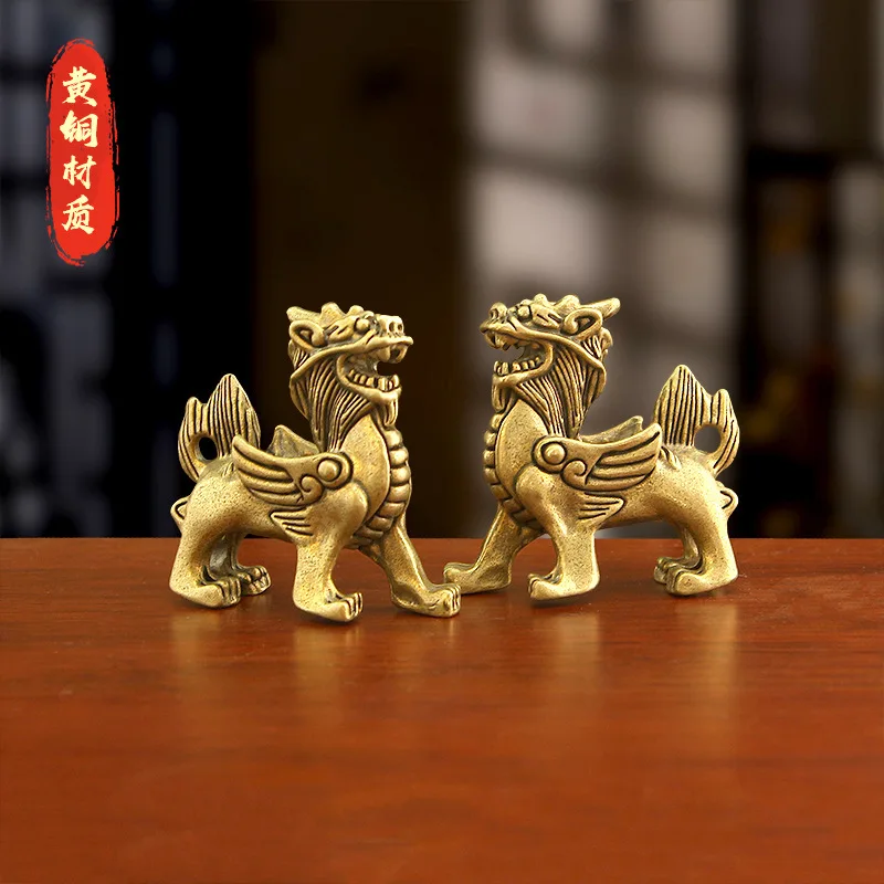 Retro brass Chinese-style flying qilin desktop ornament, a metal craft designed to attract wealth, perfect as a housewarming or