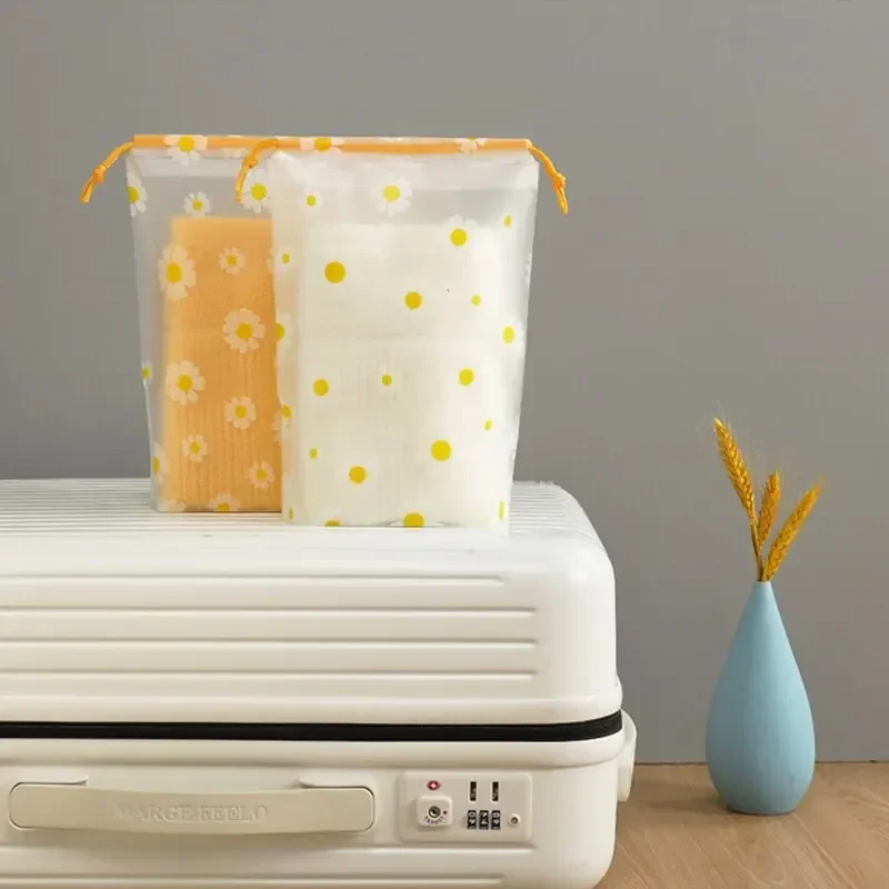 【Vendas quentes】 Bolsa de maquiagem de viagem transparente à prova d'água Toalha meia Bolsa de armazenamento de plástico com cordão para banheiro